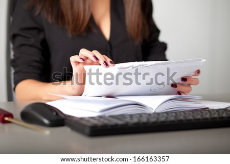 young woman secretary sort by size letters
