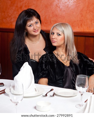 Two female friends at a restaurant