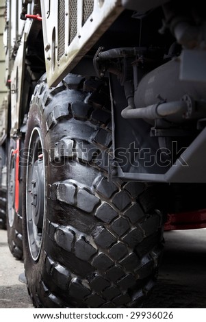 The big wheel of a military vehicle