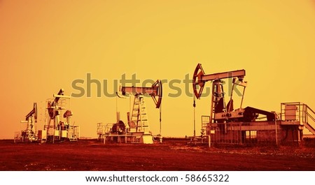 Oil Pump Jack.Orange Filtered Image. Foto Sto