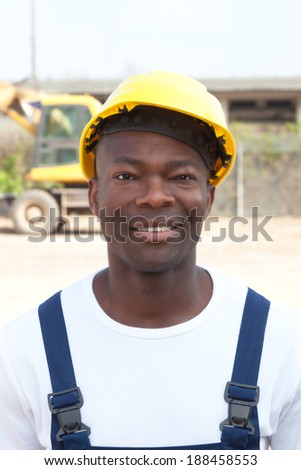 Portrait of an african worker at construction site