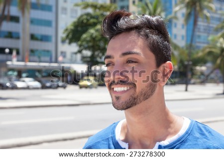 Dreaming brazilian guy in a modern city