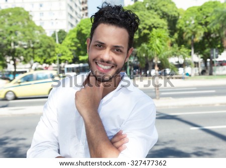 Smart man with stubble in the city