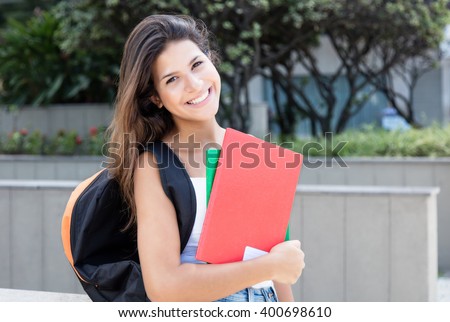 Caucasian female student looking at camera