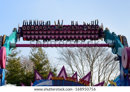 Yongin, South Korea - December 23: People Are Playing The Double Rock Spin, The Exciting Ride At A Height Of 20 Meters At Everland Resort, Yongin City, South Korea, On December 23, 2013.