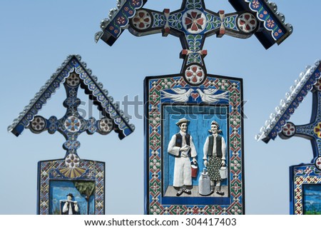 SAPANTA, ROMANIA - 08 JUNE, 2015 - Painted wooden crosses at the Merry Cemetery of Sapanta, Maramures, Romania.