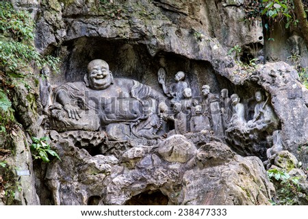 Feilai Feng grottoes with fine buddhist stone carvings. It is called \'the Peak that Flew Hither\