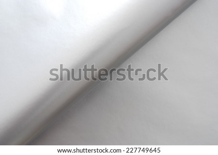 close up of an aluminum foil  with text space