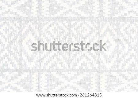 ethnic ornament on natural linen textile
