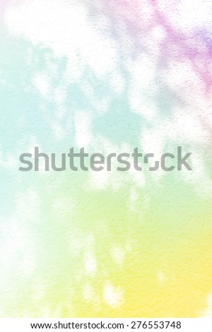 spotted lights on textured background - rainbow colors