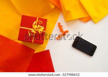 close up of isolated digital Tablet and red christmas gift box - Free text space - studio shot