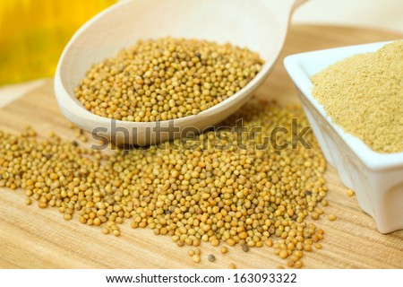 Organic mustard seeds and ground mustard