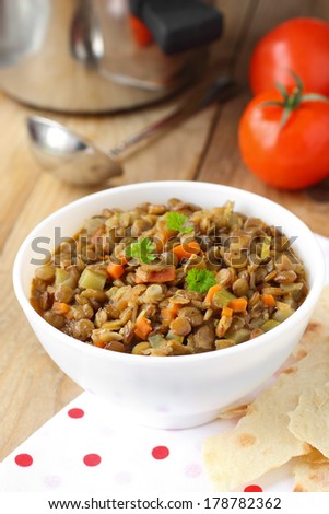 Green lentils with vegetables in a bowl