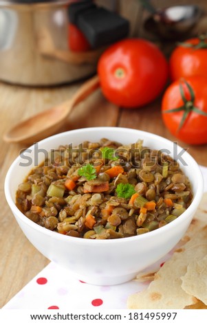 Vegan dinner - green lentils with vegetables