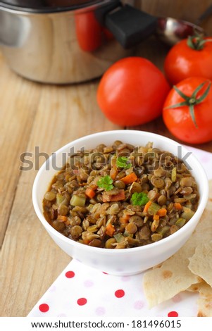 Vegan dinner - green lentils with vegetables