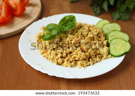 Scrambled tofu with vegetables. Vegan cooking