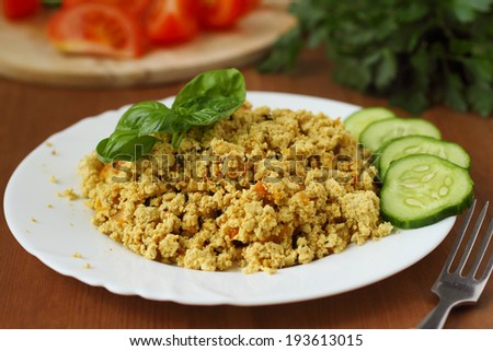 Scrambled tofu with vegetables. Vegan cooking