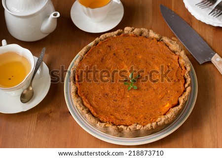 Traditional American and Canadian pumpkin pie for Thanksgiving day. Healthy vegan pie with whole-wheat flour