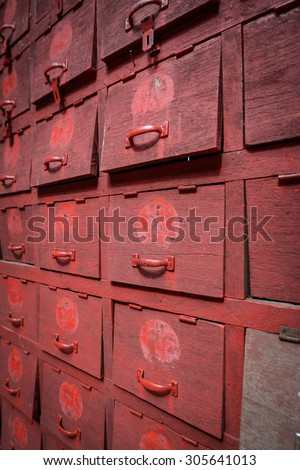 old red shoes cabinet