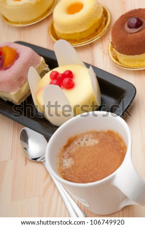 espresso coffee and  fruit cream cake pastry closeup