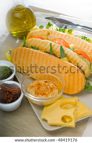 assortment of fresh homemade vegetarian  italian panini sandwich,typical italian snack