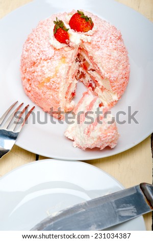 fresh pink strawberry and whipped cream dessert macro close up