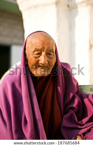 NYAUNGSHWE - MYANMAR - MARCH 2 : Unidentified Burmese Buddhist Monk on March 2, 2014 in Nyaungshwe, Myanmar. In 2012 an ongoing conflict started between Buddhists and Muslims in Myanmar.