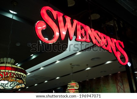 SURATTHANI, THAILAND - JUNE 4: Swensen\'s Restaurant Sign on June 4, 2014 in Suratthani, Thailand. It is a global chain of ice cream restaurants that started in San Francisco, California, USA.