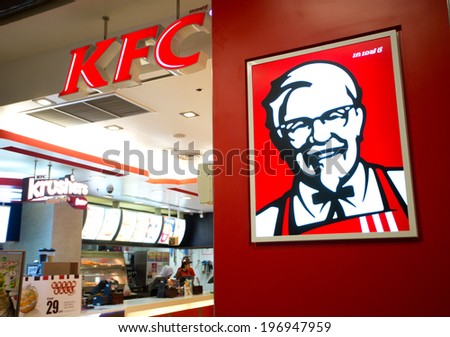 SURATTHANI, THAILAND - JUNE 4: Kentucky Fried Chicken Restaurant Sign on June 4, 2014 in Suratthani, Thailand. It is a fast food restaurant chain headquartered in United States specialized in chicken.
