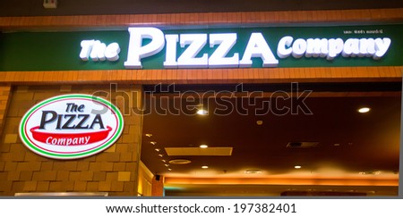 SURATTHANI, THAILAND - JUNE 7: The Pizza Company Restaurant Sign on June 7, 2014 in Suratthani, Thailand. It is a restaurant chain and international franchise based in Bangkok, Thailand.