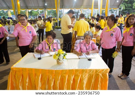 SURATTHANI, THAILAND - DECEMBER 5 : Unidentified people sign get-well messages for HM King Bhumibol on December 5, 2014 in Suratthani, Thailand. King Bhumibol is respected and revered by most Thais.