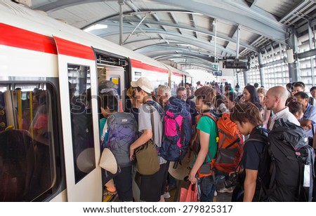 BANGKOK, THAILAND - MARCH 16 : Unidentified passengers of Suvarnabhumi Airport Rail Link Train on March 16, 2015 in Bangkok, Thailand. Airport Rail Link opened for service on 23 August 2010.
