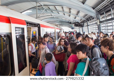 BANGKOK, THAILAND - MARCH 16 : Unidentified passengers of Suvarnabhumi Airport Rail Link Train on March 16, 2015 in Bangkok, Thailand. Airport Rail Link opened for service on 23 August 2010.