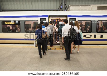 BANGKOK, THAILAND - MARCH 16 : Unidentified passengers walks in Suvarnabhumi Airport Rail Link Train on March 16, 2015 in Bangkok, Thailand. Airport Rail Link opened for service on 23 August 2010.