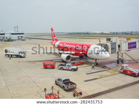 BANGKOK, THAILAND - MARCH 17 : Thai Air Asia Plane landed at Don Mueang International Airport on March 17, 2015 in Bangkok, Thailand. Air Asia company is the largest low cost airlines in Asia.