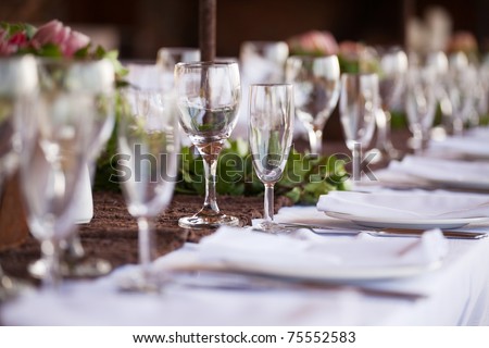 stock photo Wedding decor wine glasses and champagne flutes on table