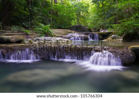 Stream in the tropical waterfall in Thailand