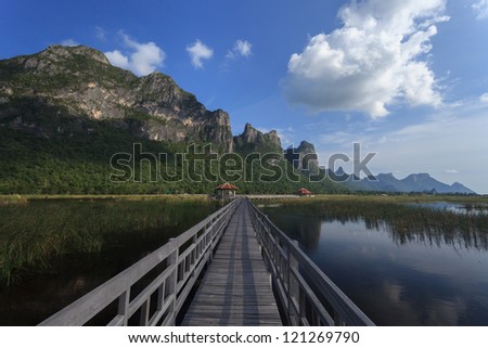 The wooden bridge in lotus lake at khao sam roi yot national park
