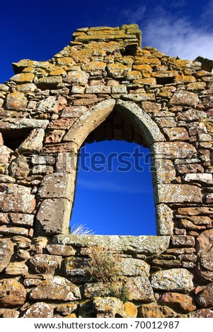 Old rock window at Dunnottar Castle, UK