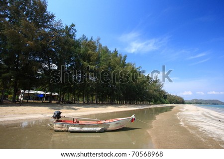 Beautiful holiday on the beach with sea sand sun and the old fishing boat at Prachuapkhirikhan Beach, Thailand