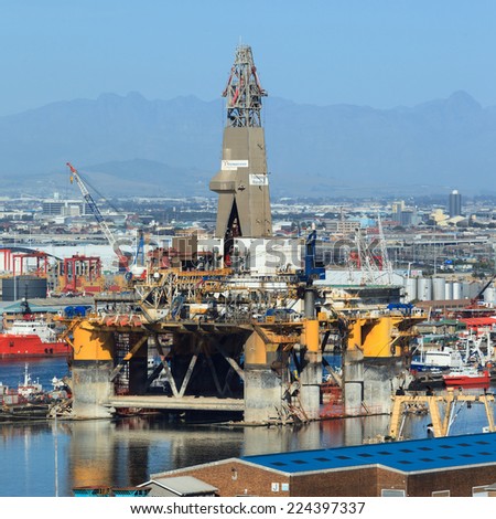 CAPE TOWN, SOUTH AFRICA-OCTOBER, 14: Semi Submersible drilling rig parked in the middle of the shipyard in downtown of Cape Town to get maintenance on October 14, 2013 in Cape Town, South Africa.