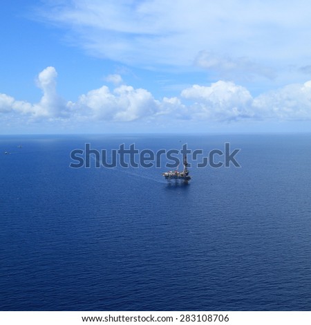 Aerial View of Offshore Jack Up Drilling Rig in The Middle of The Ocean