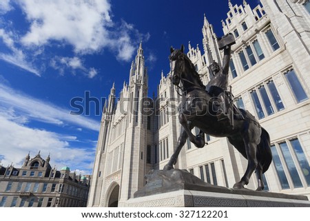 ABERDEEN SCOTLAND - 17 SEPTEMBER 2015 A statue of Robert I, King of the Scots 1306-1329, outside Marischal College on September 17, 2015. The college became Aberdeen City Council headquarters in 2011.