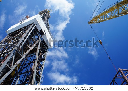 Derick of Offshore Jack Up Drilling Rig And A Rig Crane
