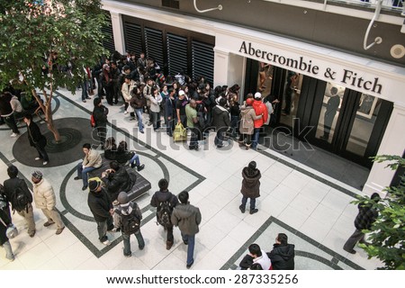 Toronto, Canada - 26 December, 2007 - people wait in line to enter an Abercrombie & Fitch\'s store.