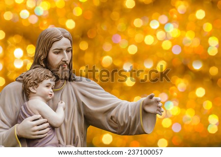 Jesus statue with a child