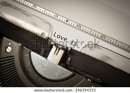 type writer with text Love is