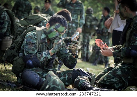 PRANBURI, PRACHUAP KHIRI KHAN , THAILAND - NOV 24, 2014: Unidentified soldier  alert and arm for maneuver in  \