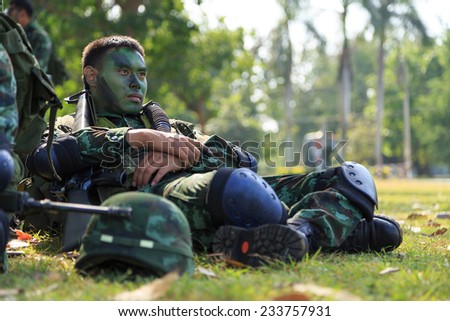 PRANBURI, PRACHUAP KHIRI KHAN , THAILAND - NOV 24, 2014: Unidentified soldier arm and waiting for maneuver in  \