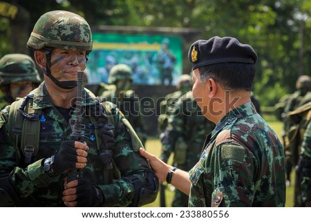 PRACHUAP KHIRI KHAN, THAILAND - NOV 24, 2014: Lieutenant General Kritsada Areeratchakul, Director of Army Training Command is preside over \